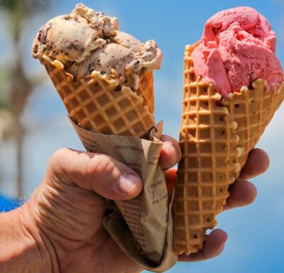 Achocolate and Strawberry ice cream on cones
